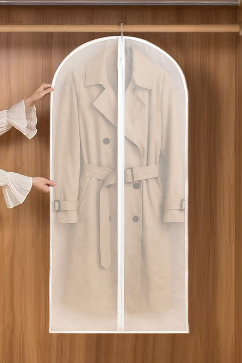Waterproof dustproof clothing cover protecting a beige trench coat in a wooden wardrobe