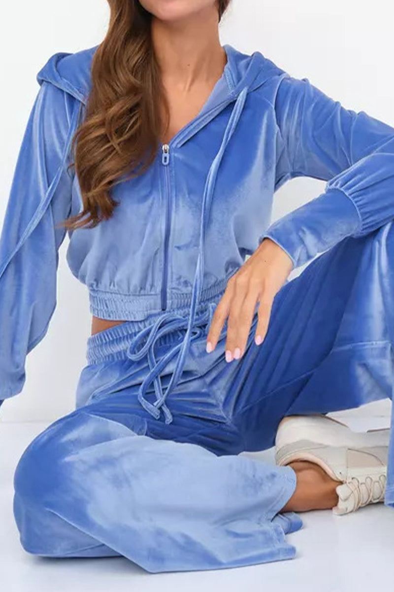 blue velour tracksuit with cropped hoodie and high-waist pants in plush fabric