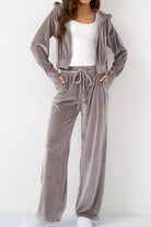 Women's grey velour tracksuit with cropped hoodie and high-waist pants
