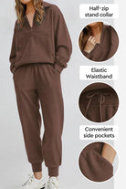 Unisex brown half-zip pullover and sweatpants set with stand collar, elastic waistband, and side pockets.