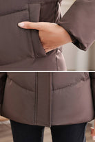 Close-up of hand in pocket on brown Everyday Warmth Coat showing mid-length, lightweight thermal insulation.