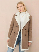 Mid-thigh faux suede sherpa coat with contrast trim and side pockets, lightweight and relaxed fit.