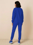 Colorblock Comfort Tracksuit with contrast curved panels and relaxed fit for slimming look and all-day comfort