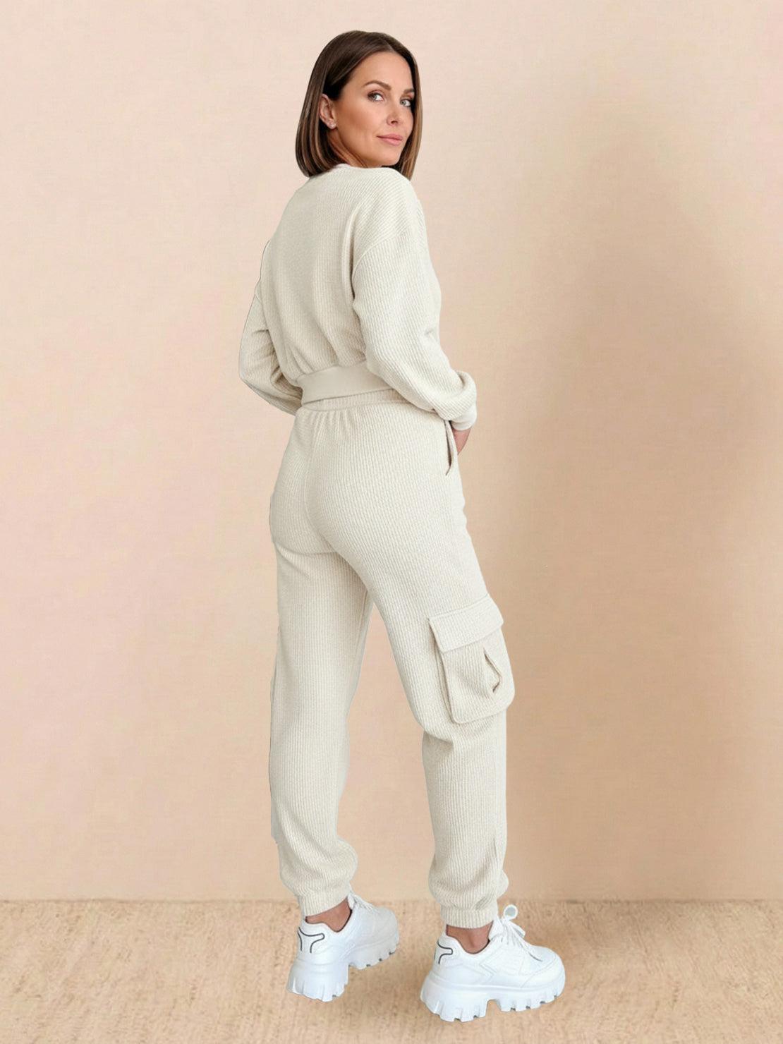 Woman wearing 100% cotton waffle knit set with long sleeves and cargo pockets, styled with white sneakers