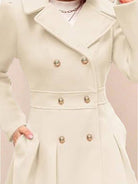 Tailored fit and flare trench coat with A-line silhouette and double-breasted buttons