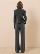 woman wearing soft warm nano-fleece zip two-piece set with wide-leg pants and hip-length jacket