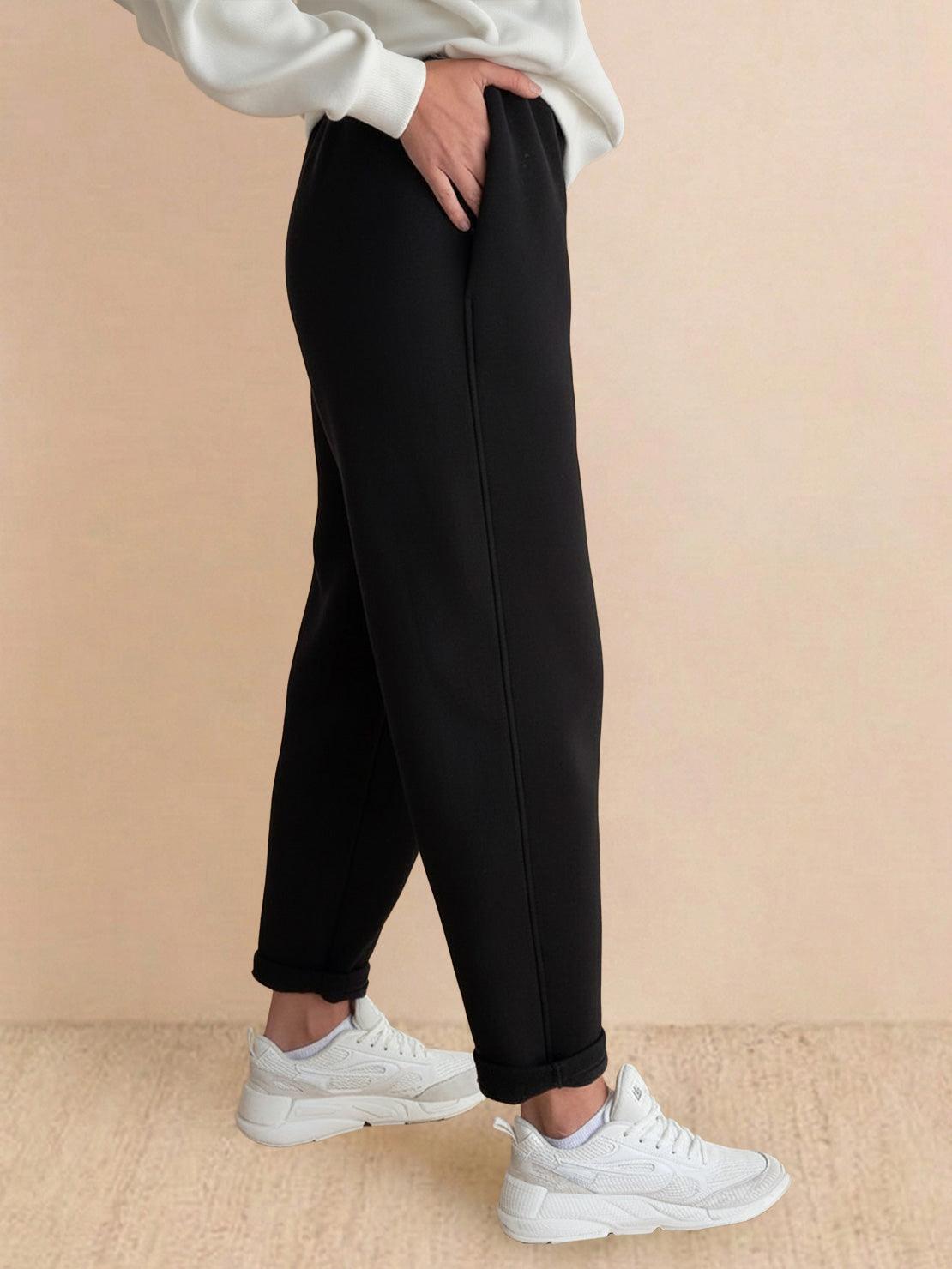 Black relaxed fit pants from Warm & Easy Two-Piece Set with soft sweatshirt fabric and pull-on waist.