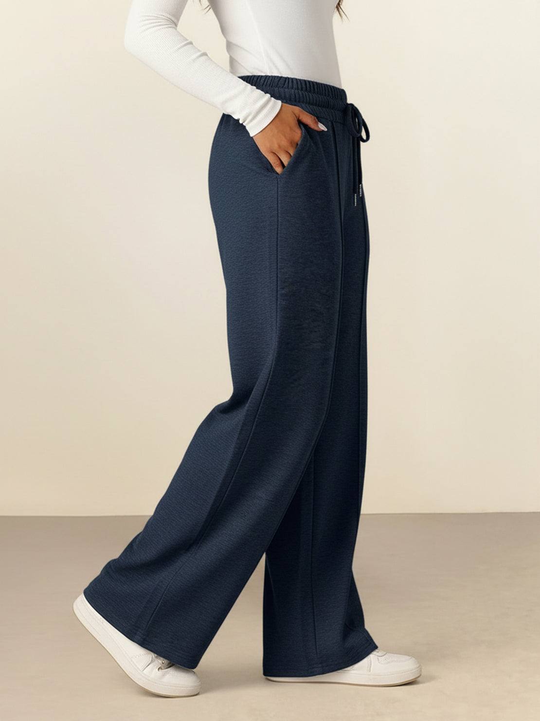 Soft knit wide-leg pants with breathable fabric and elastic drawstring waist