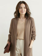 100% Australian Merino Wool longline open-front cardigan with front pockets and ribbed cuffs