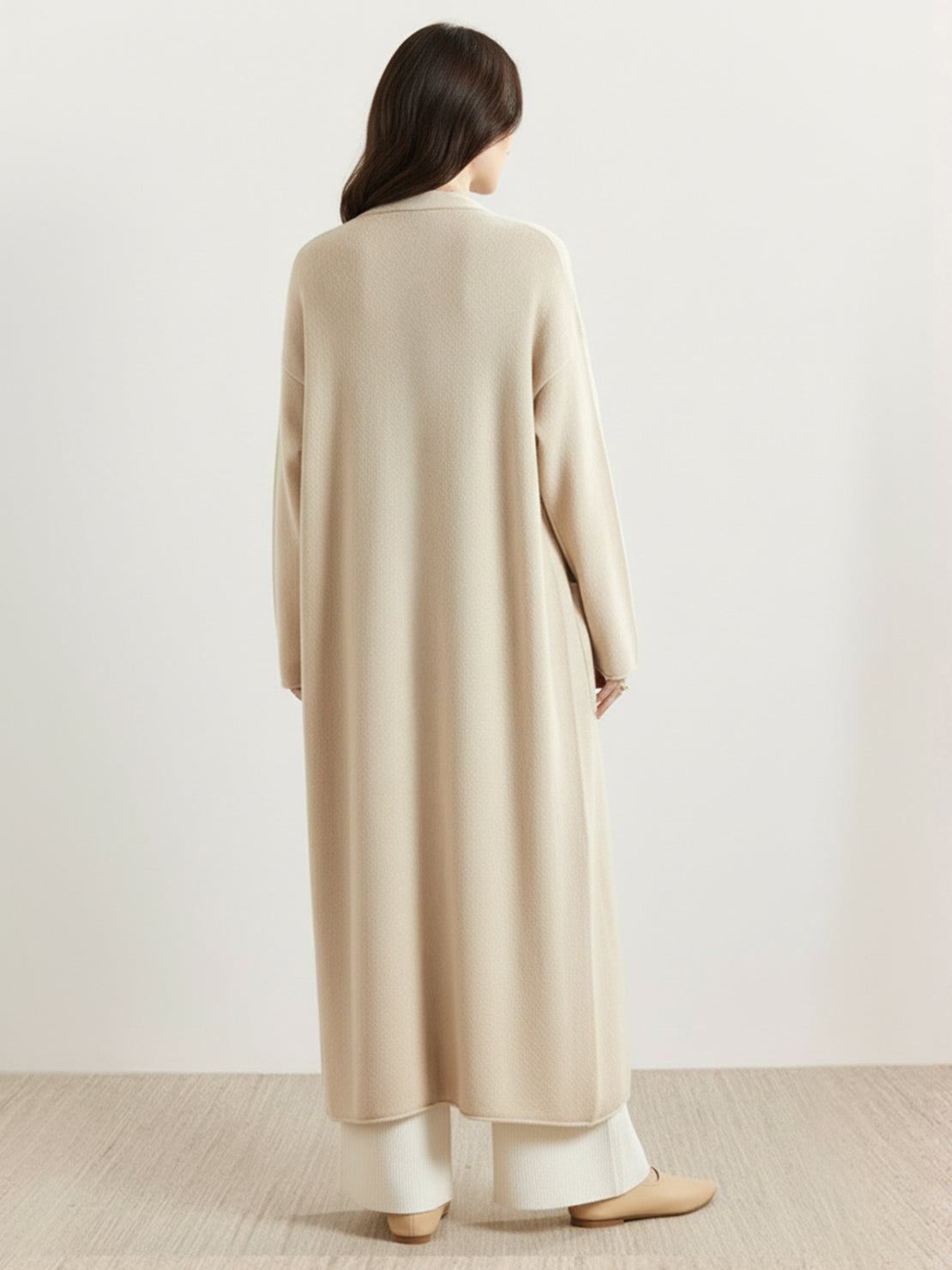 Long Australian Merino Wool cardigan with open front, ribbed cuffs, and patch pockets for fall layering