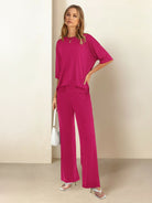 Oversized long-line loungewear set with relaxed pullover and straight-leg pants in soft, breathable knit fabric
