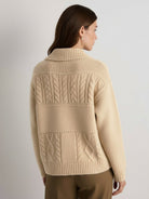 Wool-blend button-front cardigan with wide collar and drop-shoulder sleeves