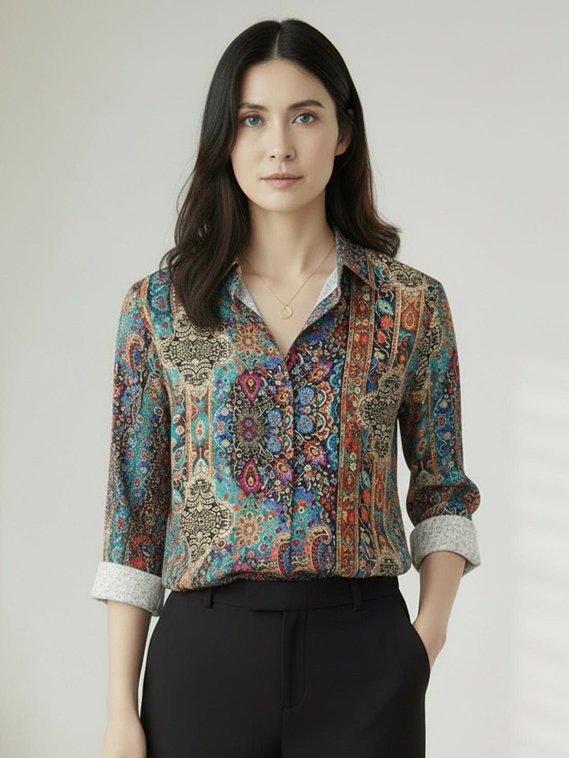 Women's floral button-down shirt with long roll-up sleeves and hip-length hem