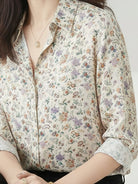 floral button-down shirt with long roll-up sleeves and relaxed hip-length fit