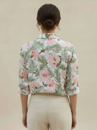floral button-down shirt with long roll-up sleeves and hip-length hem