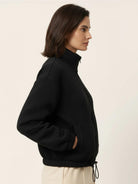 Textured cropped baseball jacket with full front zipper and stand collar