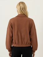 Cropped textured baseball jacket with full zipper, elastic cuffs, and waistband in relaxed fit