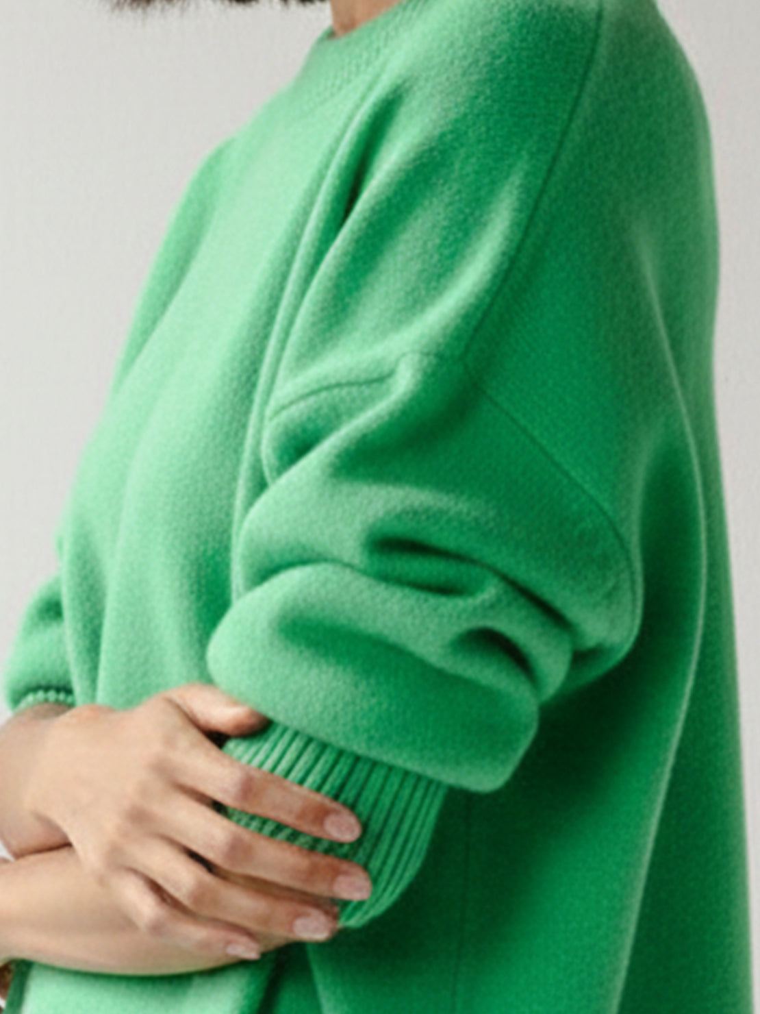 oversized crew neck knit sweater with drop-shoulder sleeves and ribbed cuffs
