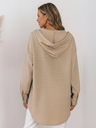 CloudKnit Oversized Hooded Shacket in textured waffle knit with button front, drawstring hood, and relaxed fit.