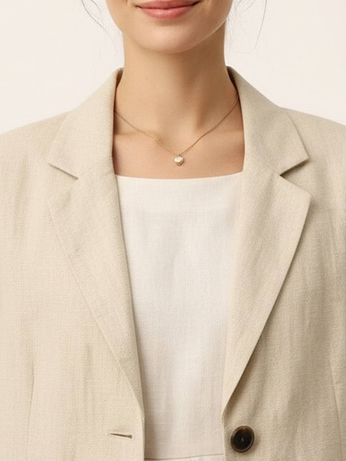 Cotton-linen blazer with notch lapels and two-button closure in natural textured fabric