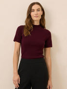 Slim fit short-sleeve 100% Merino Wool mock neck tee in neutral color