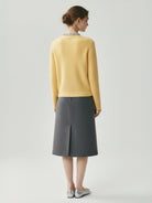 100% Alashan cashmere diamond-collar cardigan with crystal buttons and fine ribbed knit