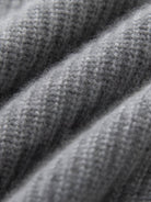 100% Alashan cashmere diamond-collar cardigan with ribbed knit and crystal buttons