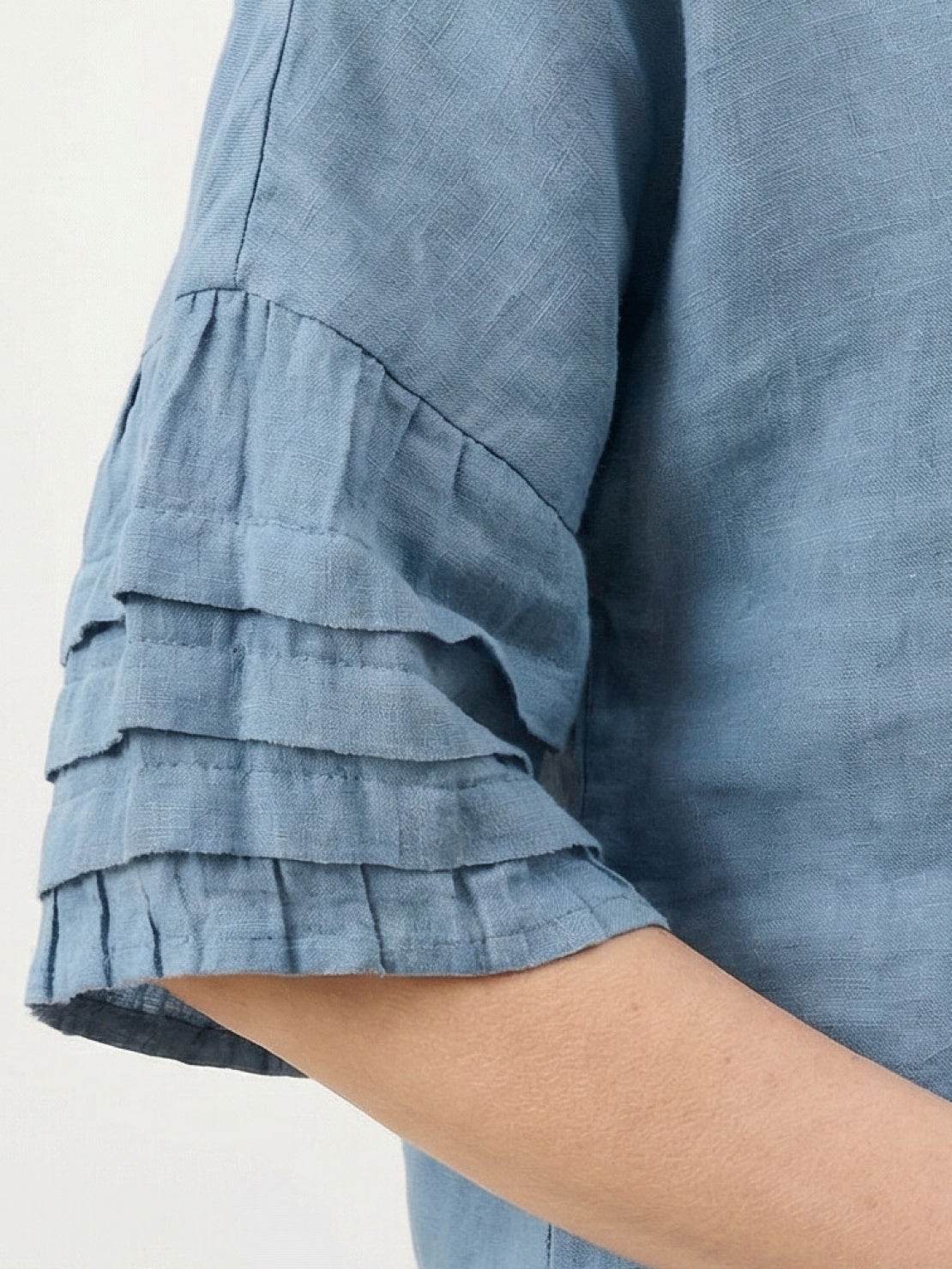 100% cotton two-piece wrap skirt and hip-length top set with crinkle texture and elastic waistband