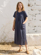 100% linen relaxed midi dress with short sleeves and front pockets