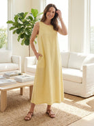 Lightweight cotton linen sleeveless maxi dress with round neckline and flowing ankle-length silhouette