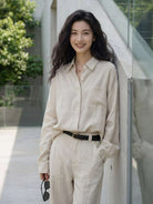 100% cotton-linen oversized shirt with dropped shoulders, curved hem, and breathable fabric