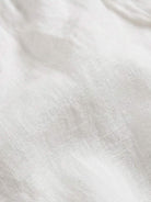 100% linen harem balloon pants with elastic drawstring waistband and side pockets in natural crinkle texture