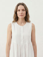 Sleeveless cotton linen pleated midi dress with pintuck bodice and calf-length A-line skirt