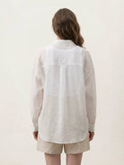 Lightweight 100% linen sheer overshirt with relaxed fit and button front