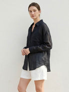100% linen sheer overshirt with relaxed fit and classic point collar, semi-transparent fabric and button front.