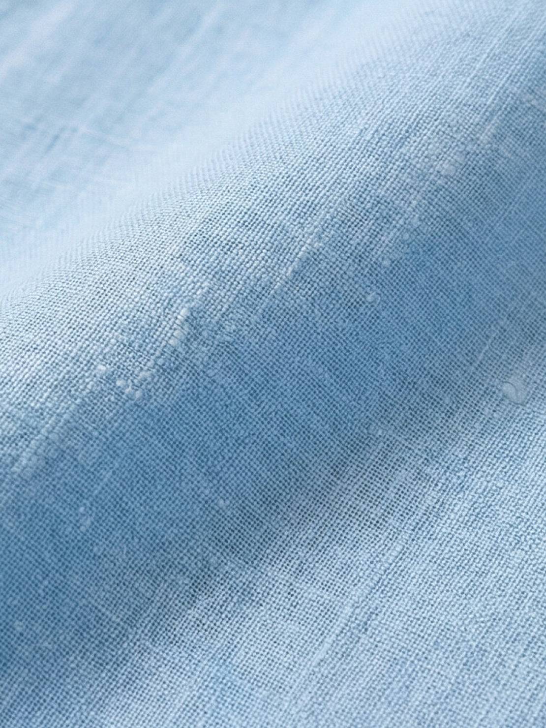 100% linen two-way button blouse with Peter Pan collar and cap sleeves in relaxed A-line fit