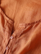 Orange cotton linen midi dress with smocked waist and embroidery