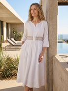 Rusty orange cotton linen dress with embroidered smocked waist and asymmetric midi skirt