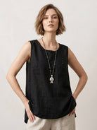 Lightweight sleeveless 100% cotton linen top with curved hem and chest pocket detail