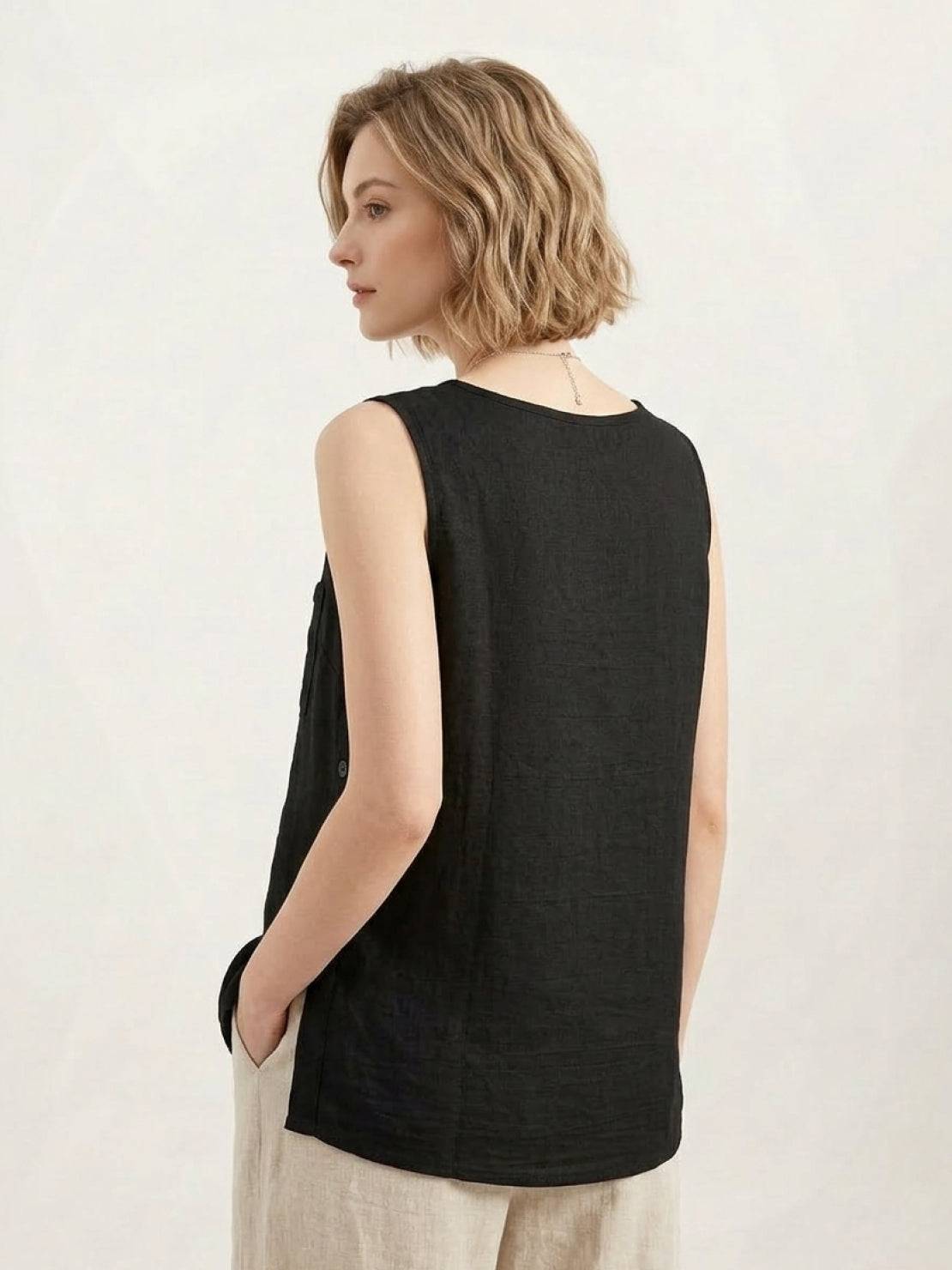 Lightweight sleeveless cotton linen top with chest pocket and curved hem