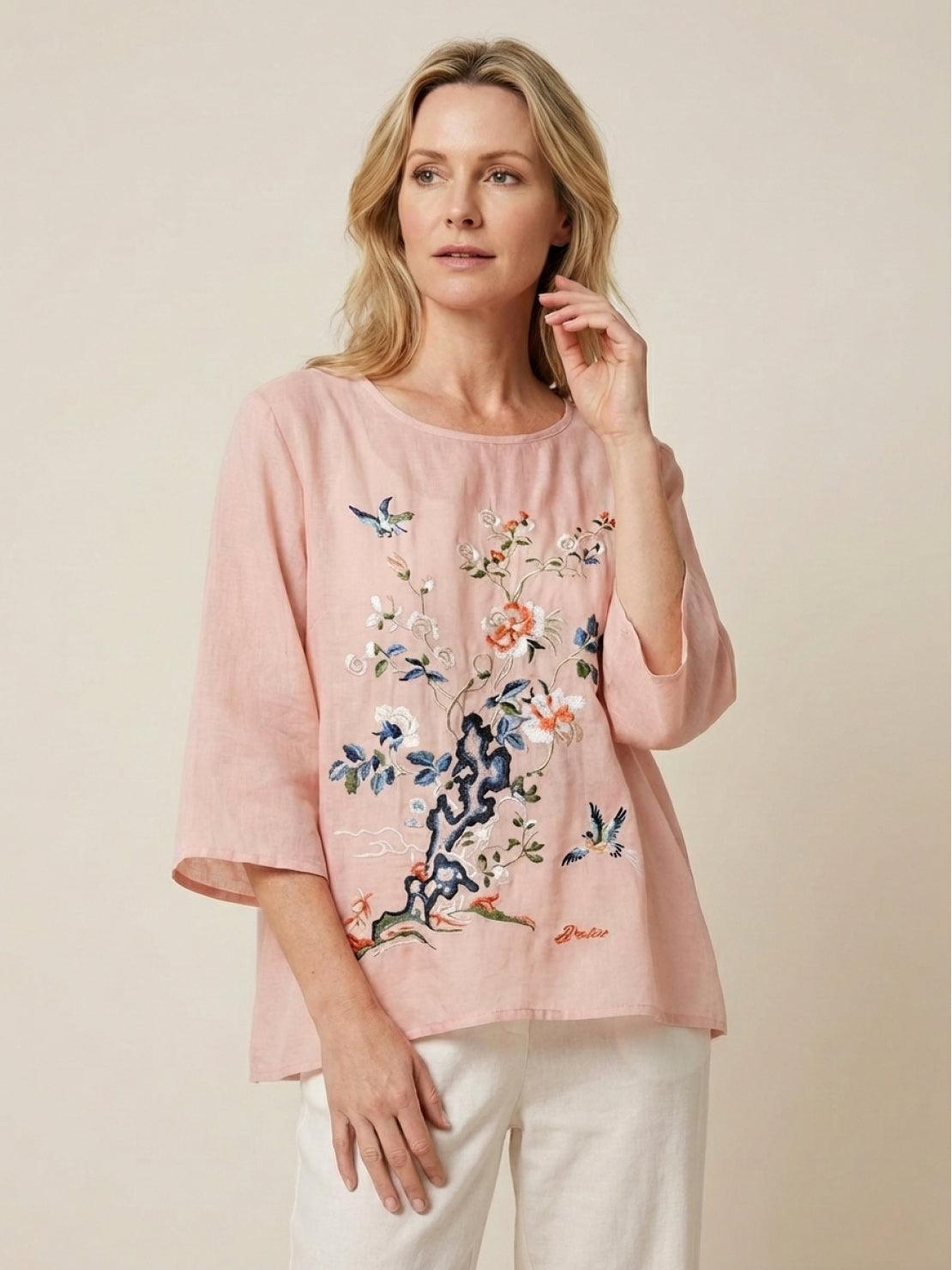 100% cotton linen hand-embroidered shirt with 3/4 flare sleeves and asymmetric hem