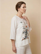 Hand-embroidered 100% cotton-linen shirt with flared 3/4 sleeves and asymmetric hem