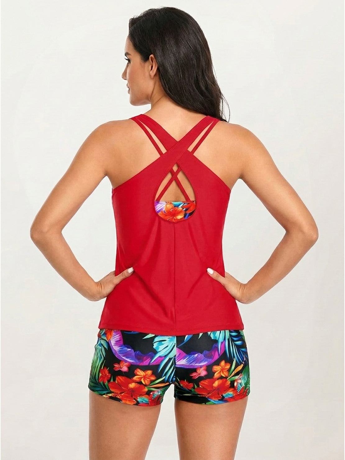 Three-piece tankini set with criss-cross back and printed sports bra and boy shorts