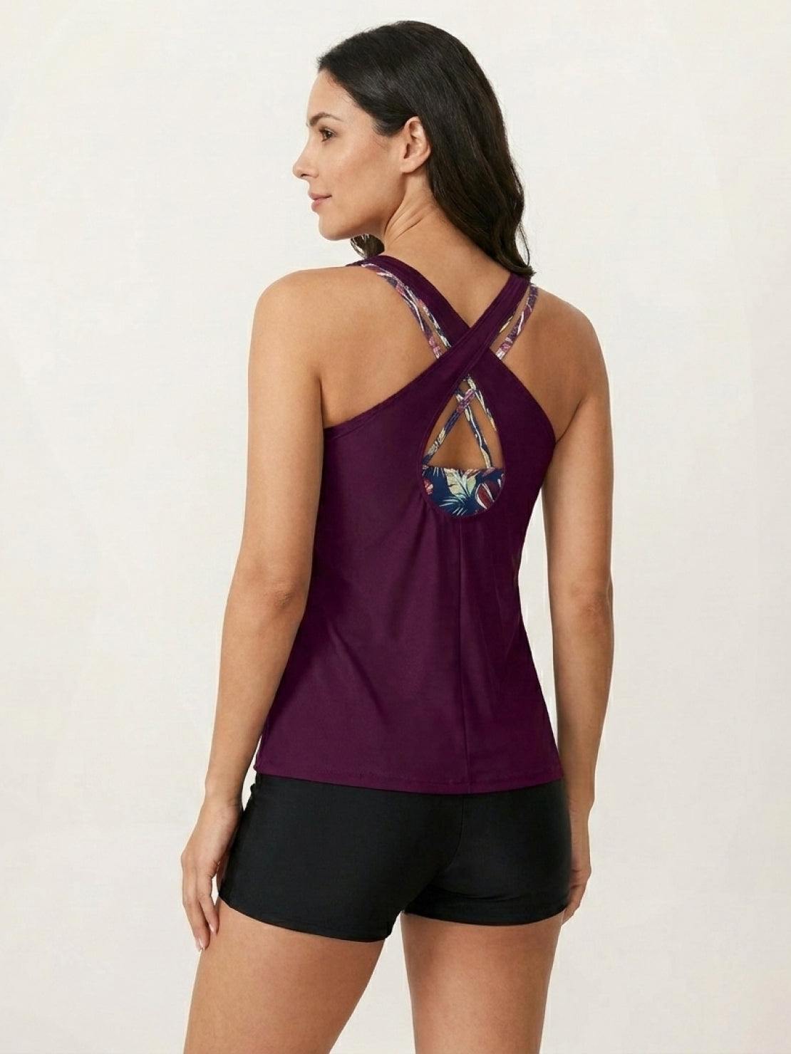 Three-piece tankini set with solid scoop neck tank and criss-cross back sports bra and boy shorts