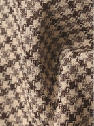 Structured houndstooth commuter blazer in black and white with relaxed fit and notched lapel collar