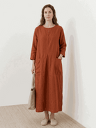 100% cotton A-line pocket maxi dress with 3/4 sleeves and ankle-length hem