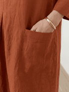 100% cotton A-line pocket maxi dress with 3/4 sleeves and ankle-length hem