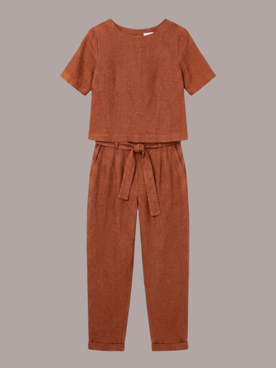 Woman wearing 100% cotton linen monochrome co-ord set with relaxed short-sleeve top and straight-leg pants