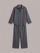 Woman wearing an oversized 100% cotton shirt with wide-leg pants co-ord set in a relaxed, breathable style