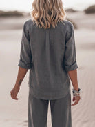 Model wearing oversized 100% cotton shirt and wide-leg pants co-ord set in relaxed fit